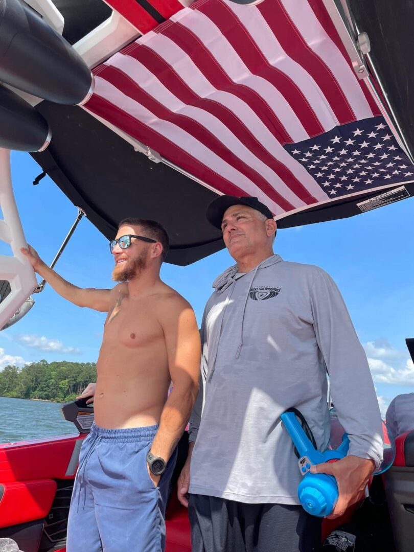 Two Men Standing in Boat