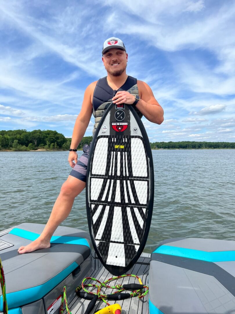 Man standing with Wakeboard