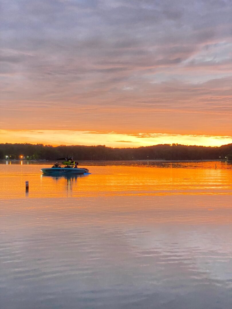 Runabout Boat on Sunset