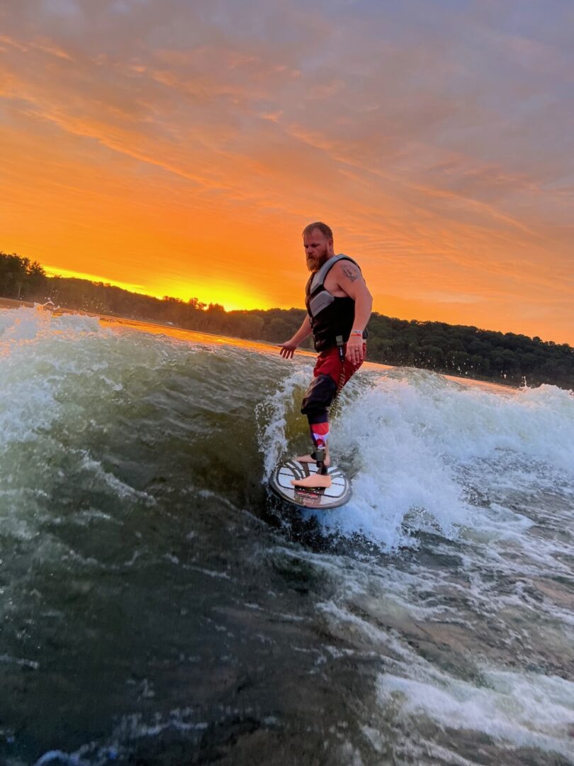 Man Surfing on sunset