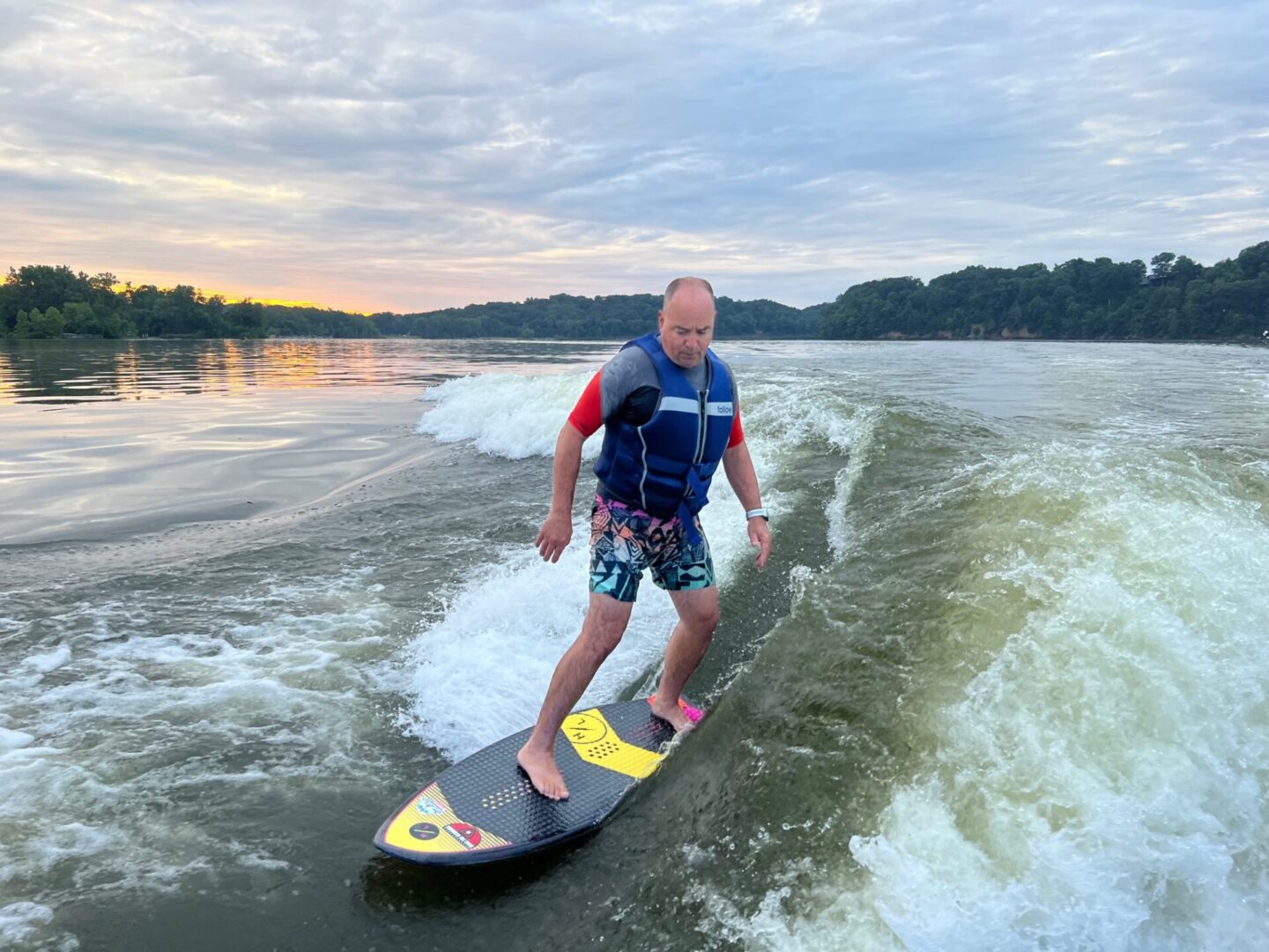 Man Surfing with Life Jacket